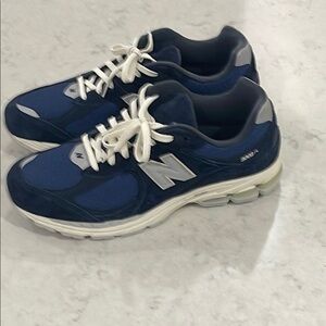 New balance 2002r navy blue worn 1 time.  Excellent condition size 13